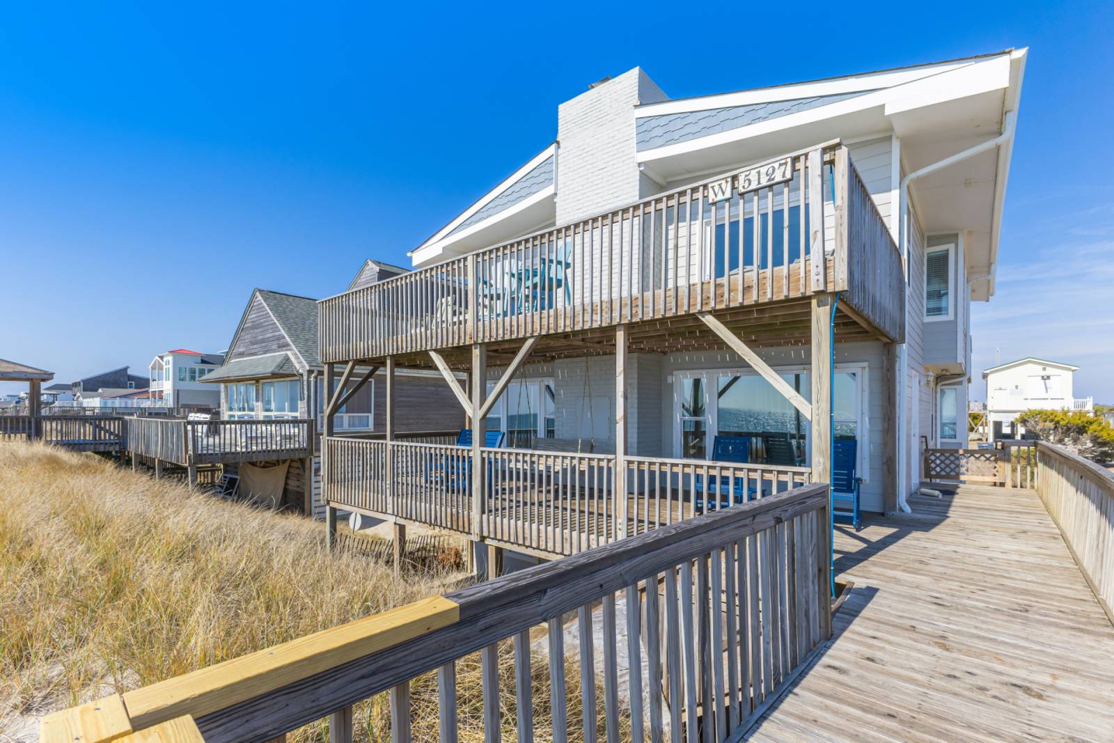 Back of house with private beach access